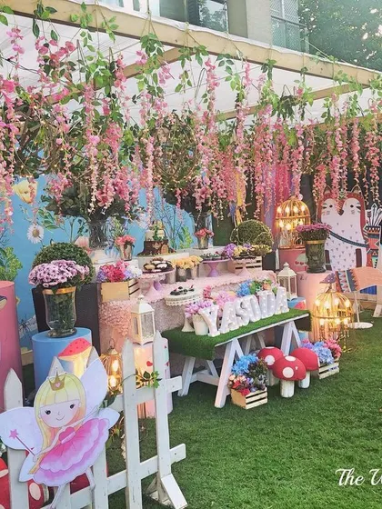 Welcome to the enchanted forest. I love creating secret garden parties where every detail, from the whimsical toadstools to the hanging wisteria, builds a world of magic for the birthday girl and her friends.