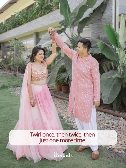 The feminine urge to twirl once, then twice, then just one more time. A playful shot of a couple dancing at their pre-wedding event.