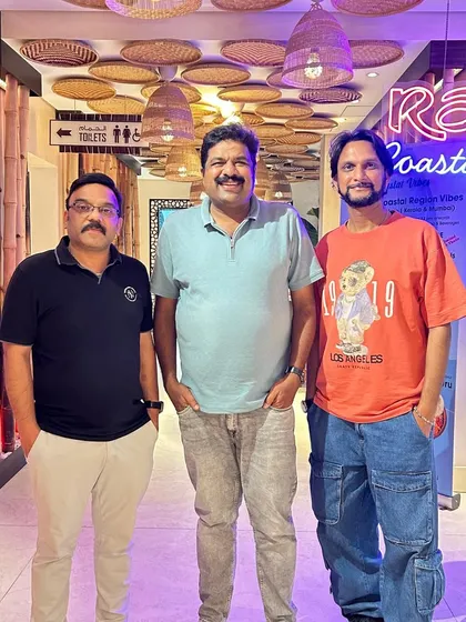With friends and organizers in Dubai. These international trips are a great way to meet Kannadigas from different walks of life.