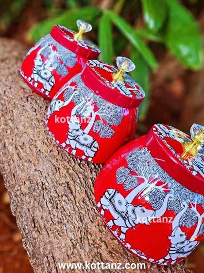 The Kalpavruksha, or wish-fulfilling tree, is guarded by divine elephants. These beautiful dry fruit jars feature this powerful motif, making them a meaningful souvenir.