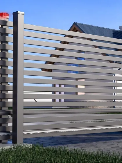 We automate property entrances with reliable gate motors. This image shows a motor installed for a sliding gate, which enables effortless operation via remote control, RFID, or even integration with your smartphone.
