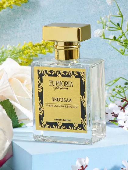 For this floral perfume, I used a backdrop of white flowers and a soft blue sky. This creates a fresh, romantic, and feminine visual that perfectly communicates the 'Seductive & Feminine' scent profile.