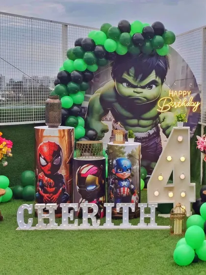 A different angle of the rooftop superhero celebration, showing how the decor elements come together to create a powerful and exciting atmosphere.