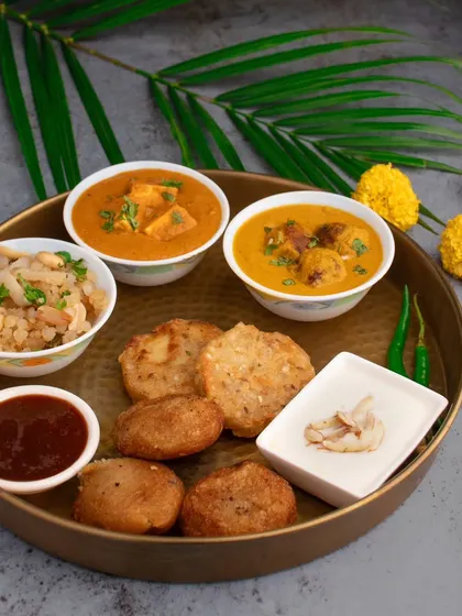 A slightly different angle of the Shivratri thali, showcasing the variety of textures and colors in the spread.