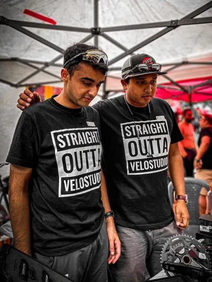 The team from Velo Studio at their stall, ready to help customers with their cycling needs.