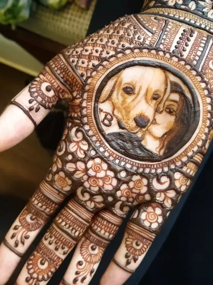 The final, stained portrait of the bride and her dog, Bruno. The deep, rich color from my herbal henna paste brings out the shading and details, creating a lasting and beautiful tribute.