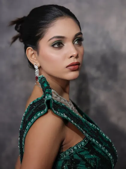 Another profile shot, showing the elegant updo.