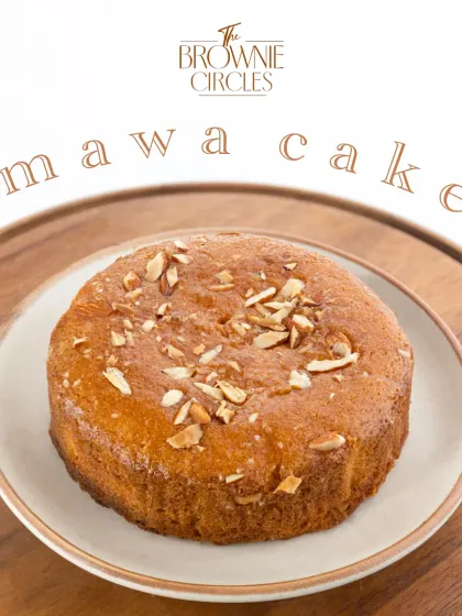 This is my Mawa Cake, a nod to the classic Parsi bakery treat. It's a rich, dense, buttery cake made with milk solids and topped with sliced almonds.