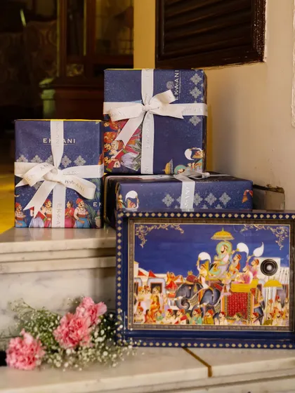 A stack of gift boxes from the Golden Dunes collection, tied with elegant ribbons. This image captures the anticipation and joy of gifting, with packaging that is as special as the presents inside.