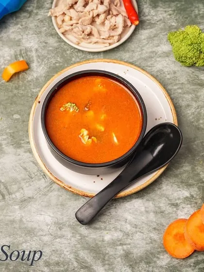 Our Tom Yum Soup is a Thai classic, offering a perfect balance of hot and sour flavors. It's a light yet flavorful soup infused with herbs like lemongrass and galangal.