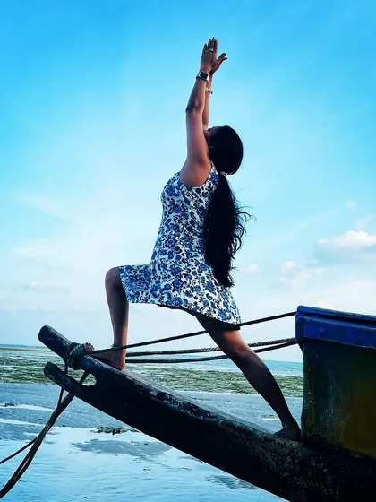Finding my inner warrior on the bow of a boat in the Andamans. This Virabhadrasana I pose felt symbolic of navigating life's waters with strength, balance, and an open heart.