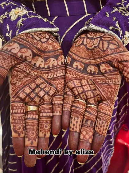 Henna stain check. This is the gorgeous reddish-brown color you can expect after about 48 hours. The elephant motifs look absolutely adorable.