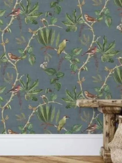 The same bird and vine wallpaper in a sophisticated blue-grey colorway. The darker background gives the design a more formal and refined look.