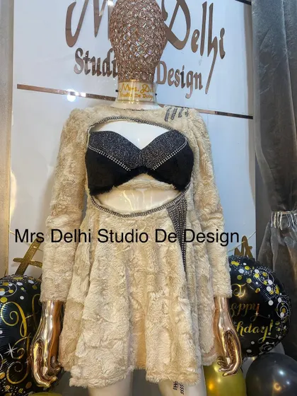 Our winter dress ready for a birthday celebration. The unique design and luxurious texture make it a perfect party outfit.