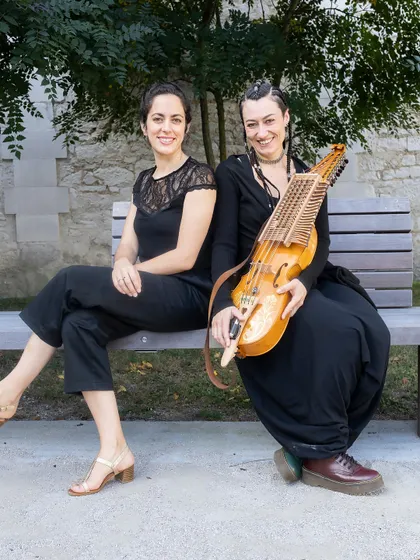 A portrait of two of our female artists, who collaborate on multiple projects like 'Pajarillo Verde' and 'Sangam'. Our ensemble is built on these strong artistic partnerships.