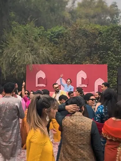 A wider view of the daytime mehndi party, showing the crowd enjoying the music. My goal is always to get everyone out of their seats and onto the dance floor.