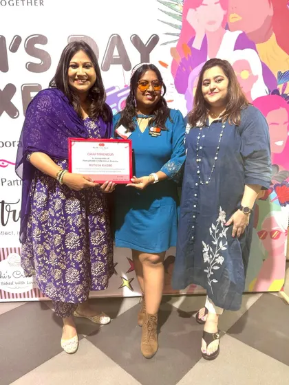 Posing with my award. I am so thankful for platforms that recognize and support women in business.