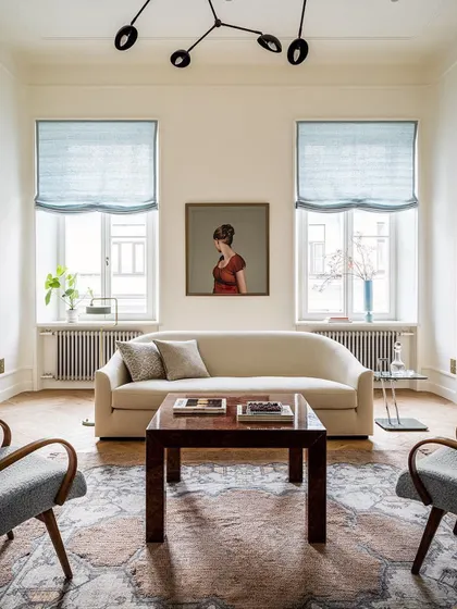 Minimum is the new maximum. This living room uses simple, elegant furniture and a neutral color palette to create a calm and sophisticated space. The focus is on clean lines and quality pieces.