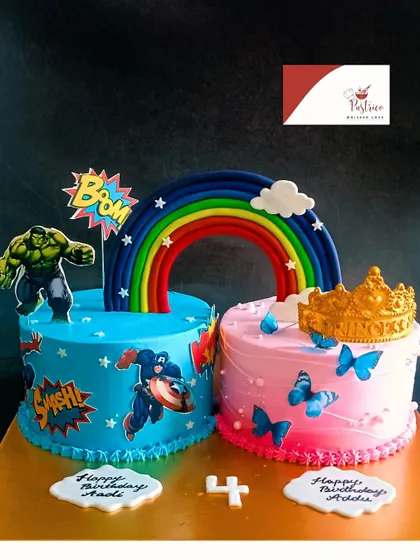 A fun cake for twins, featuring a Hulk and Captain America theme on one side and a princess butterfly theme on the other.