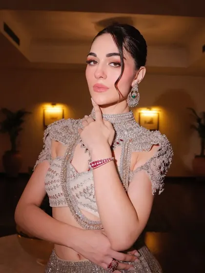 A close-up of the futuristic glam look, featuring an Anjalee and Arjun Kapoor blouse with incredible structural detail. The high-neck design is both a blouse and a necklace.