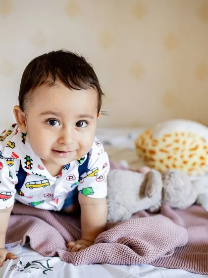This sweet boy is on the move. Capturing milestones like crawling is perfect for an at-home session where your baby feels most comfortable to explore.