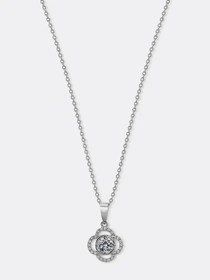A silver necklace with a crystal clover pendant, shot on a pure white background for a clean, crisp look suitable for any online store.