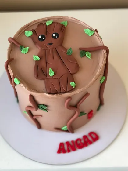 "I Am Groot!" A special cake for a Guardians of the Galaxy fan, featuring a handcrafted Baby Groot on a chocolate buttercream cake.