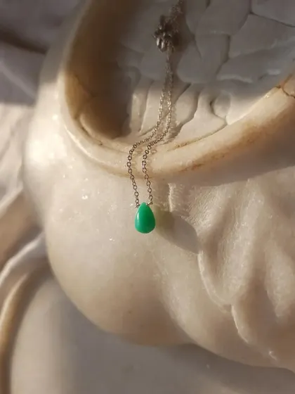 The Green Chrysoprase teardrop pendant, a stone that promotes love of truth.