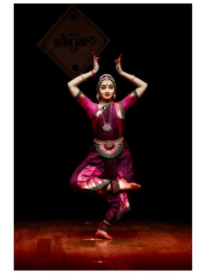A strong pose from a performance at Aikyam 2024, showing the confidence and stage presence required of a soloist.
