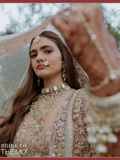 A portrait of a bride, confident and serene. This is more than just a picture; it's capturing her essence in the quiet moments before she walks down the aisle, a timeless image for our "Bride of The Mo'" series.