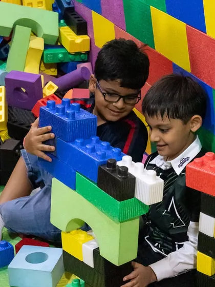 Brothers building together with our giant legos. It's a great way for them to learn to cooperate and create.