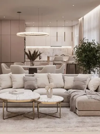 Another view of the open-plan layout, showing the cohesion between the living room, dining area, and kitchen. This approach is perfect for modern family living and entertaining.