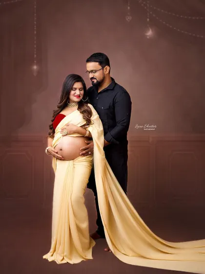 A modern take on the traditional saree look. We use a long, flowing fabric to create a dramatic train, blending classic elegance with a contemporary studio style.