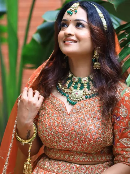The Royal Indian Bride. Inspired by celebrity wedding looks, this style combines a rich, embroidered lehenga with statement jewelry for a truly regal effect.