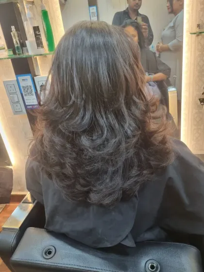 A gallery of finished haircuts, showing the beautiful layers and shape from the back. You can see the volume and texture each cut creates.