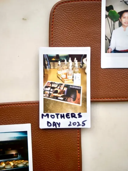 A close-up of a Polaroid from our Mother's Day memory vault, a tradition I cherish.