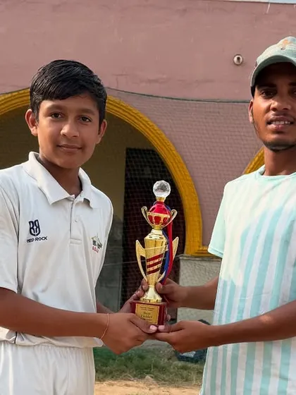 Prateek receiving the best bowler award for his excellent spell in the final match. He has a bright future as a fast bowler.