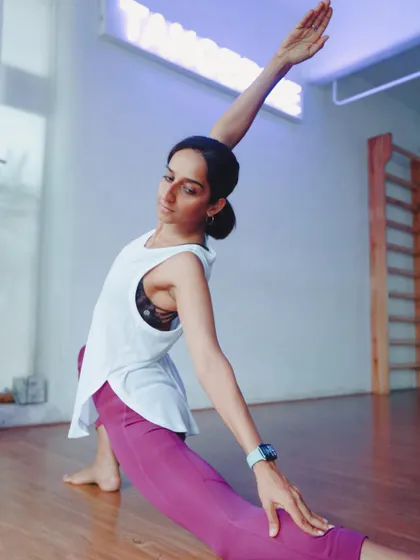 A moment of extension and grace in a variation of a lunge. This pose opens the hips and chest, creating a feeling of expansion.