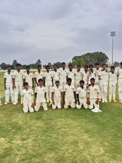 The U-16 boys' team, looking focused and prepared for their game.