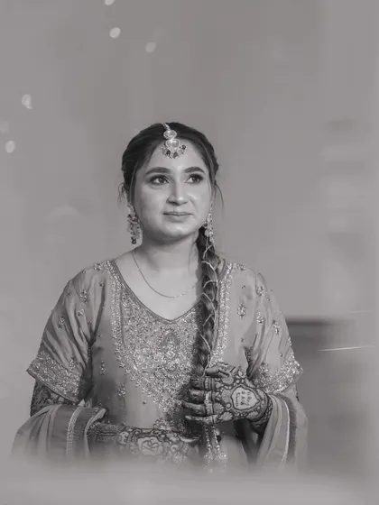 A timeless black and white portrait of the bride during her Mehndi ceremony.