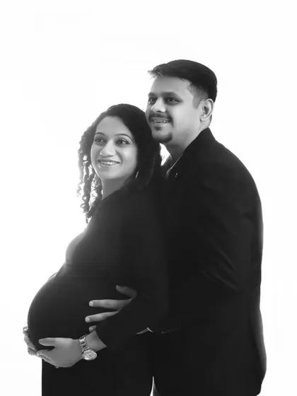 A beautiful black and white portrait of the couple, capturing a shared look of hope and excitement for their future.