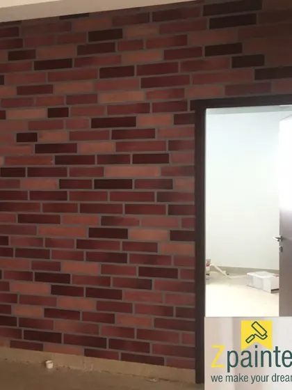 A multi-toned brick texture wall that adds depth and character next to a doorway. The variation in color gives it a more authentic, aged appearance.