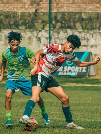 The competitive fire is evident in this duel between two talented young players.