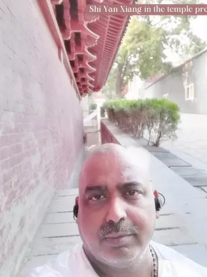 A quiet moment along the walls of the Shaolin Temple. This is a place for mindfulness and Chan meditation, where the environment encourages a calm and focused mind.