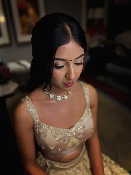 A close-up of the "no-makeup" makeup look. The focus is on creating a flawless, skin-like base and adding just a touch of definition to the eyes and lips.