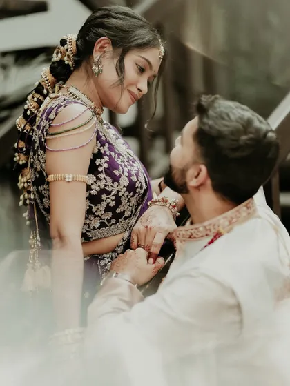 In a quiet moment away from the crowd, I capture the pure, unspoken connection between two people. This candid portrait focuses on the gentle touch and loving gaze that tells their entire story without a single word.
