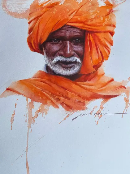 A watercolour portrait of a man in a vibrant orange turban. I used wet on wet techniques and splatters to create a dynamic and expressive feel.