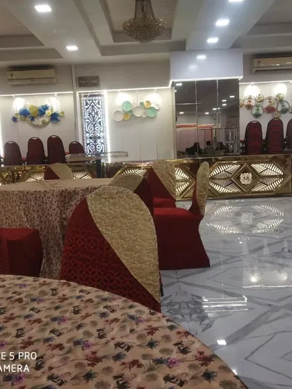 The combination of guest seating and my buffet setup, demonstrating how I integrate my catering services into the overall event design.