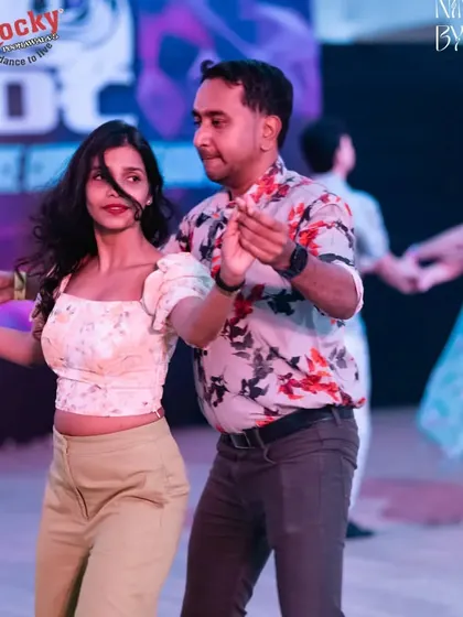 Leading a turn on the GIDC dance floor. Clear, gentle leading is something I emphasize in all my classes.