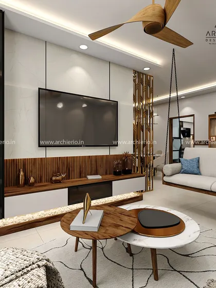 This living room features a beautiful wooden swing and a sleek TV unit with fluted paneling. The design is a harmonious blend of traditional and contemporary styles.